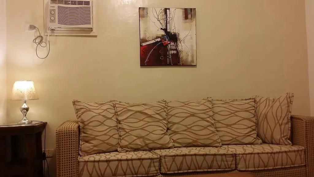 אורחן Panglao Palms Apartelle