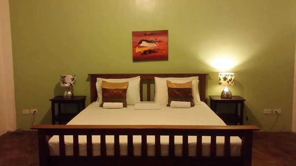 אורחן Panglao Palms Apartelle